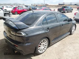 2015 Mitsubishi Lancer Evolution GSR z VIN JA32W8FV2FU020047, wystawiony jako IAAI lot #41890897 z przebiegiem 121 089 mil mil oraz . Historia ofert i sprzedaży dostępna na DreamBid. Obrazek 4.
