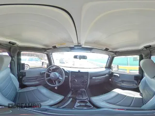 2009 Jeep Wrangler X z VIN 1J4FA24179L716499, wystawiony jako Copart lot #58342675 z przebiegiem 116 871 mil mil oraz Szkoda całkowita • Salvage title. Historia ofert i sprzedaży dostępna na DreamBid. Obrazek 13.