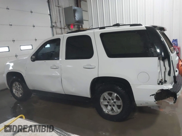 2007 GMC Yukon SLT with VIN 1GKFK130X7R203221, listed as a IAAI auction lot 41583409 with 254,586 mi miles. Bid and sale history available at carsss.com. Image 6.