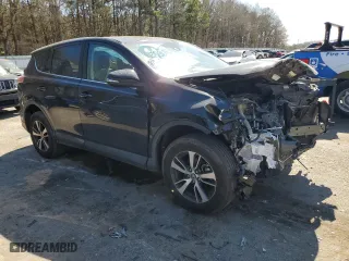 2018 Toyota RAV4 XLE with VIN 2T3WFREV0JW469717, listed as a Copart auction lot 47416435 with 97,142 mi miles and Salvage Title. Bid and sale history available at carsss.com. Image 4.