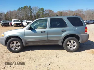2007 Ford Escape XLT with VIN 1FMCU03137KB28362, listed as a IAAI auction lot 41689766 with 154,345 mi miles and . Bid and sale history available at DreamBid. Image 14.