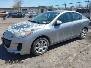 2012 Mazda Mazda3 i Sport with VIN JM1BL1UG6C1516181, listed as a IAAI auction lot 42130825 with 140,868 mi miles. Bid and sale history available at carsss.com. Image 2.