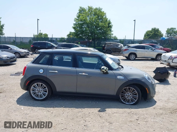 2019 MINI Hardtop 4 Door Cooper S with VIN WMWXU3C57K2H54547, listed as a IAAI auction lot 42492037 with 74,657 mi miles and . Bid and sale history available at DreamBid. Image 14.