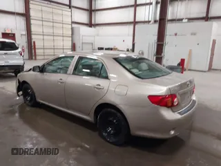 2009 Toyota Corolla with VIN 1NXBU40E19Z014460, listed as a IAAI auction lot 41973023 with 74,927 mi miles. Bid and sale history available at carsss.com. Image 3.