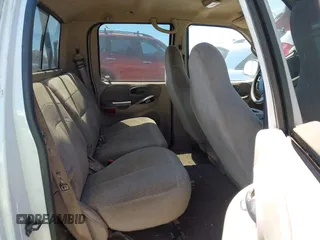 2001 Ford F-150 XLT with VIN 1FTRW07W21KE19926, listed as a IAAI auction lot 42750523 with Not provided miles and . Bid and sale history available at DreamBid. Image 8.