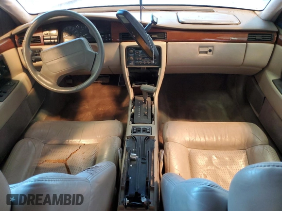 1993 Cadillac Seville Touring STS z VIN 1G6KY5295PU817593, wystawiony jako Copart lot #47807075 z przebiegiem Nie podano mil oraz Czysty tytuł • Clean title. Historia ofert i sprzedaży dostępna na DreamBid. Obrazek 8.