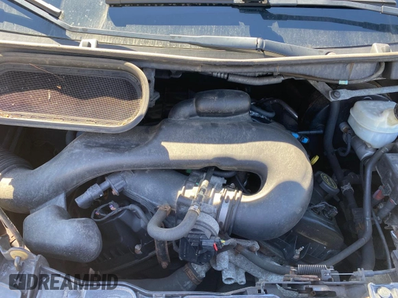 2015 Ford Transit Cargo with VIN 1FTNR2CMLFKA14542, listed as a Copart auction lot 52863735 with 134,970 mi miles and Clean title. Bid and sale history available at DreamBid. Image 7.
