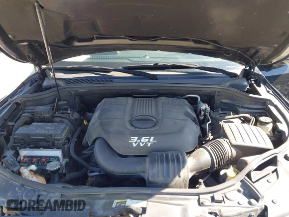 2013 Dodge Durango SXT with VIN 1C4RDJAG2DC617983, listed as a IAAI auction lot 41805992 with 210,560 mi miles and . Bid and sale history available at carsss.com. Image 10.