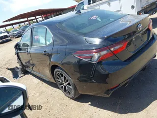 2023 Toyota Camry SE with VIN 4T1G11AK1PU800063, listed as a IAAI auction lot 42121633 with 41,572 mi miles. Bid and sale history available at carsss.com. Image 3.