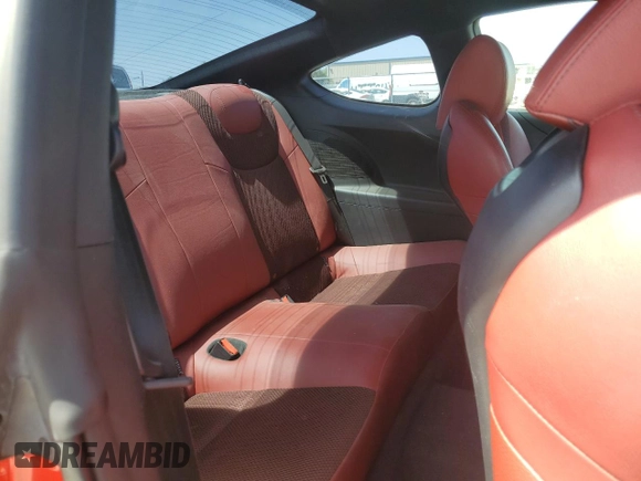 2013 Hyundai Genesis Coupe Premium z VIN KMHHT6KD7DU112883, wystawiony jako Copart lot #57590735 z przebiegiem 104 226 mil mil oraz Szkody całkowita. Historia ofert i sprzedaży dostępna na DreamBid. Obrazek 10.