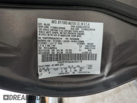 2002 Ford Taurus with VIN 1FAFP59S62A256119, listed as a Copart auction lot 79581164 with 57,128 mi miles and Clean title. Bid and sale history available at DreamBid. Image 12.