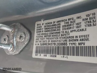 2011 Honda CR-V LX with VIN 5J6RE3H37BL008665, listed as a IAAI auction lot 42060005 with 128,447 mi miles. Bid and sale history available at carsss.com. Image 9.