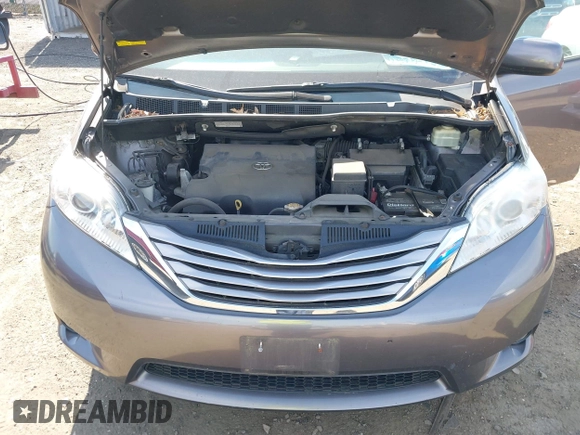 2015 Toyota Sienna XLE with VIN 5TDYK3DC9FS685768, listed as a IAAI auction lot 42062942 with 132,242 mi miles. Bid and sale history available at carsss.com. Image 10.