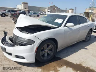 2016 Dodge Charger SXT with VIN 2C3CDXHG0GH332848, listed as a IAAI auction lot 41820072 with 123,626 mi miles. Bid and sale history available at carsss.com. Image 2.