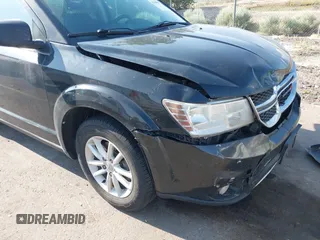 2013 Dodge Journey SXT with VIN 3C4PDDBG1DT606887, listed as a IAAI auction lot 42440507 with 250,836 mi miles and . Bid and sale history available at DreamBid. Image 12.