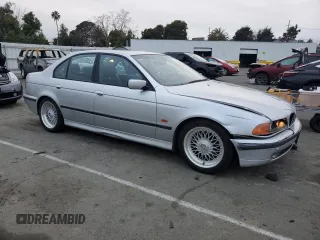 2000 BMW 5 Series 528iA with VIN WBADM6342YGV01382, listed as a Copart auction lot 44736415 with 167,919 mi miles and Salvage Title. Bid and sale history available at carsss.com. Image 4.