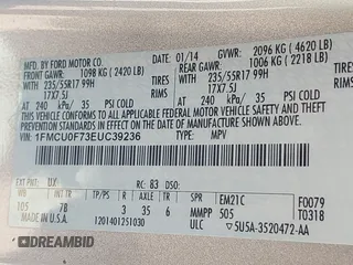 2014 Ford Escape S with VIN 1FMCU0F73EUC39236, listed as a IAAI auction lot 41772126 with 202,044 mi miles. Bid and sale history available at carsss.com. Image 9.