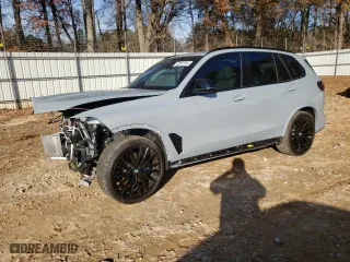 2025 BMW X5 M60i with VIN 5UX33EU02S9W63434, listed as a Copart auction lot 85053804 with 6,762 mi miles and Salvage Title. Bid and sale history available at carsss.com. Image 1.