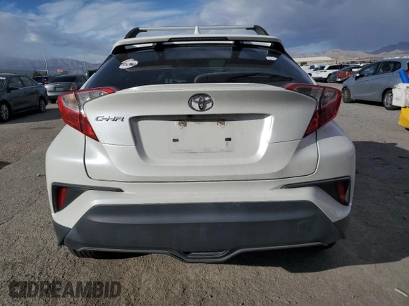 2019 Toyota C-HR XLE with VIN JTNKHMBX5K1057113, listed as a Copart auction lot 47771055 with 84,245 mi miles and Salvage Title. Bid and sale history available at DreamBid. Image 6.