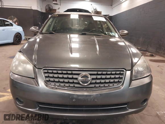 2006 Nissan Altima 2.5 S with VIN 1N4AL11D06N319256, listed as a IAAI auction lot 42007570 with 155,101 mi miles. Bid and sale history available at carsss.com. Image 12.