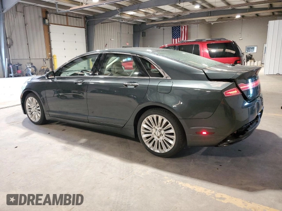 2015 Lincoln MKZ z VIN 3LN6L2J95FR613519, wystawiony jako Copart lot #59165895 z przebiegiem 117 630 mil mil oraz Szkoda całkowita • Salvage title. Historia ofert i sprzedaży dostępna na DreamBid. Obrazek 2.