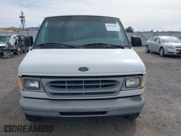 1998 Ford Econoline Cargo with VIN 1FTRE142XWHC01733, listed as a IAAI auction lot 41685605 with 154,476 mi miles. Bid and sale history available at carsss.com. Image 6.