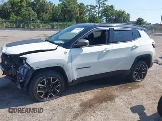2021 Jeep Compass Trailhawk with VIN 3C4NJDDB7MT564467, listed as a IAAI auction lot 42330939 with 76,963 mi miles and . Bid and sale history available at DreamBid. Image 14.