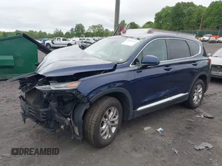 2019 Hyundai Santa Fe SE z VIN 5NMS2CAD3KH022518, wystawiony jako IAAI lot #42289725 z przebiegiem 102 547 mil mil oraz . Historia ofert i sprzedaży dostępna na DreamBid. Obrazek 2.