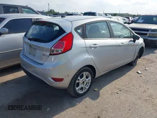 2014 Ford Fiesta SE with VIN 3FADP4EJ3EM217736, listed as a IAAI auction lot 42139037 with 138,378 mi miles and . Bid and sale history available at DreamBid. Image 4.