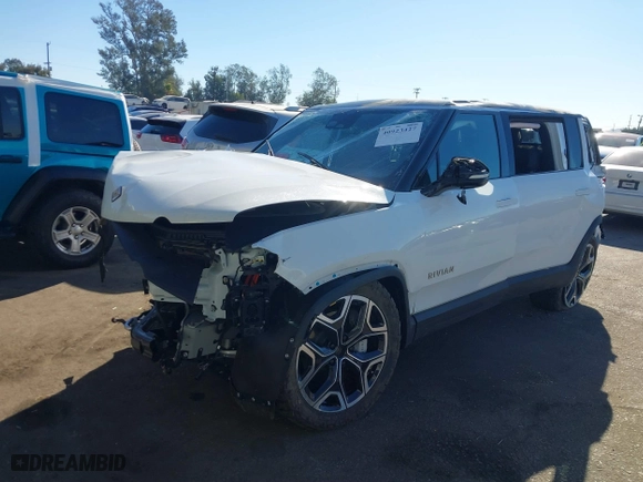 2025 Rivian R1S Adventure with VIN 7PDSGBBA1SN051995, listed as a IAAI auction lot 40923427 with 1 mi miles. Bid and sale history available at carsss.com. Image 17.