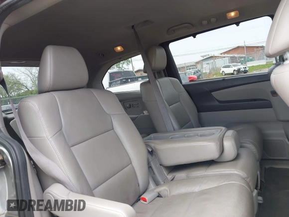 2014 Honda Odyssey EX-L with VIN 5FNRL5H60EB115792, listed as a IAAI auction lot 42064607 with 191,055 mi miles and . Bid and sale history available at carsss.com. Image 8.