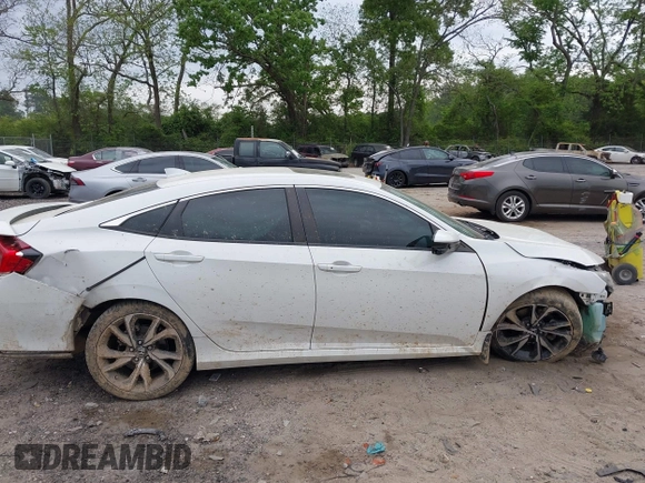 2019 Honda Civic Si z VIN 2HGFC1E51KH701626, wystawiony jako IAAI lot #42059028 z przebiegiem 120 151 mil mil oraz . Historia ofert i sprzedaży dostępna na DreamBid. Obrazek 13.