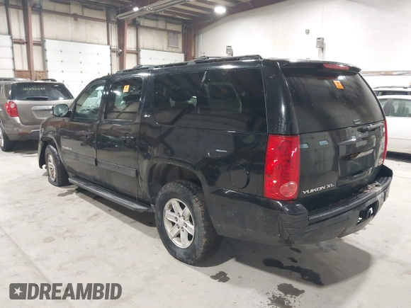 2013 GMC Yukon XL SLT with VIN 1GKS2KE70DR296356, listed as a IAAI auction lot 41986948 with 274,445 mi miles. Bid and sale history available at carsss.com. Image 3.