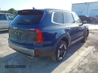 2025 Kia Telluride S with VIN 5XYP64GCXSG587826, listed as a IAAI auction lot 42065749 with 1,864 mi miles and . Bid and sale history available at DreamBid. Image 4.