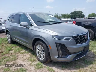 2024 Cadillac XT6 FWD Luxury z VIN 1GYKPAR48RZ747722, wystawiony jako IAAI lot #41923351 z przebiegiem Nie podano mil oraz . Historia ofert i sprzedaży dostępna na DreamBid. Obrazek 1.