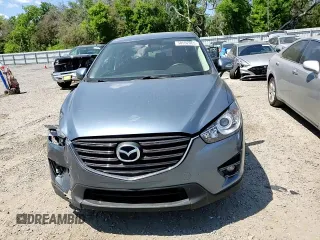 2016 Mazda CX-5 Touring with VIN JM3KE2CY0G0894283, listed as a Copart auction lot 50592065 with 86,400 mi miles and Salvage Title. Bid and sale history available at carsss.com. Image 12.