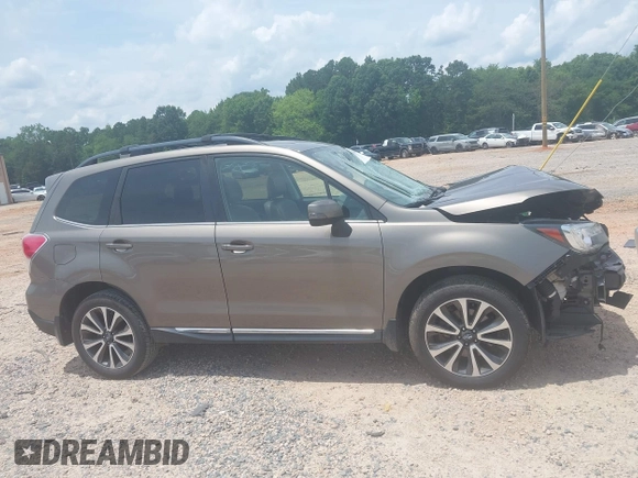 2017 Subaru Forester Touring with VIN JF2SJGWCXHH558789, listed as a IAAI auction lot 42518698 with 112,294 mi miles and . Bid and sale history available at DreamBid. Image 13.