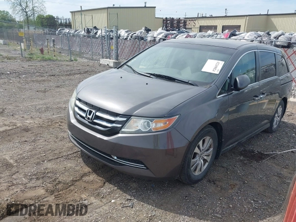 2015 Honda Odyssey EX with VIN 5FNRL5H42FB054557, listed as a IAAI auction lot 42249824 with 199,147 mi miles and . Bid and sale history available at DreamBid. Image 2.