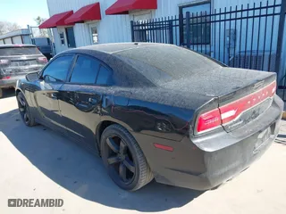 2013 Dodge Charger SE with VIN 2C3CDXBG9DH681172, listed as a IAAI auction lot 41761125 with 117,040 mi miles. Bid and sale history available at carsss.com. Image 3.