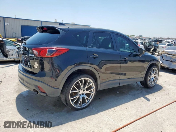 2014 Mazda CX-5 Touring with VIN JM3KE2CY5E0316077, listed as a Copart auction lot 58218735 with 190,789 mi miles and Salvage title. Bid and sale history available at DreamBid. Image 3.