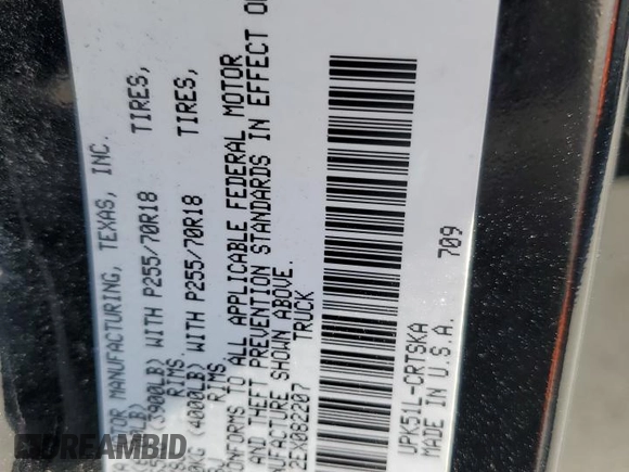 2014 Toyota Tundra SR z VIN 5TFRM5F12EX082207, wystawiony jako Copart lot #49867445 z przebiegiem 80 820 mil mil oraz Szkoda całkowita • Salvage title. Historia ofert i sprzedaży dostępna na DreamBid. Obrazek 14.