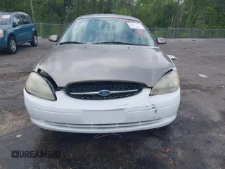 2003 Ford Taurus SE Standard with VIN 1FAFP53U63G125751, listed as a IAAI auction lot 41933803 with 196,710 mi miles. Bid and sale history available at carsss.com. Image 13.