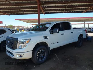 2019 Nissan Titan Pro-4X with VIN 1N6BA1F45KN533051, listed as a IAAI auction lot 42587343 with 134,768 mi miles and . Bid and sale history available at DreamBid. Image 2.