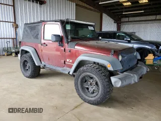 2008 Jeep Wrangler X with VIN 1J4FA241X8L541485, listed as a Copart auction lot 54050235 with 145,748 mi miles and Salvage title. Bid and sale history available at DreamBid. Image 4.