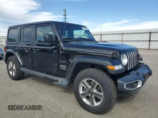 2019 Jeep Wrangler Unlimited Sahara z VIN 1C4HJXEN0KW588687, wystawiony jako Copart lot #52812895 z przebiegiem 91 486 mil mil oraz Szkoda całkowita • Salvage title. Historia ofert i sprzedaży dostępna na DreamBid. Obrazek 4.