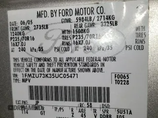2005 Ford Explorer XLT z VIN 1FMZU73K35UC05471, wystawiony jako Copart lot #58441485 z przebiegiem 165 777 mil mil oraz Szkoda całkowita • Salvage title. Historia ofert i sprzedaży dostępna na DreamBid. Obrazek 13.