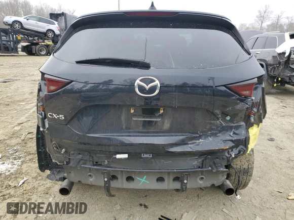 2020 Mazda CX-5 Touring with VIN JM3KFACM1L0767976, listed as a Copart auction lot 46299715 with 148,137 mi miles and Salvage Title. Bid and sale history available at carsss.com. Image 6.