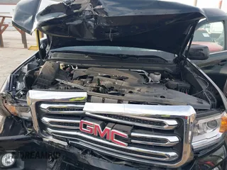 2019 GMC Canyon 4WD SLE z VIN 1GTG6CEN2K1354585, wystawiony jako IAAI lot #42014158 z przebiegiem 34 269 mil mil oraz . Historia ofert i sprzedaży dostępna na DreamBid. Obrazek 10.