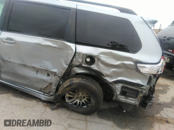 2015 Toyota Sienna XLE with VIN 5TDYK3DC0FS589947, listed as a IAAI auction lot 36567379 with 130,969 mi miles and . Bid and sale history available at DreamBid. Image 6.
