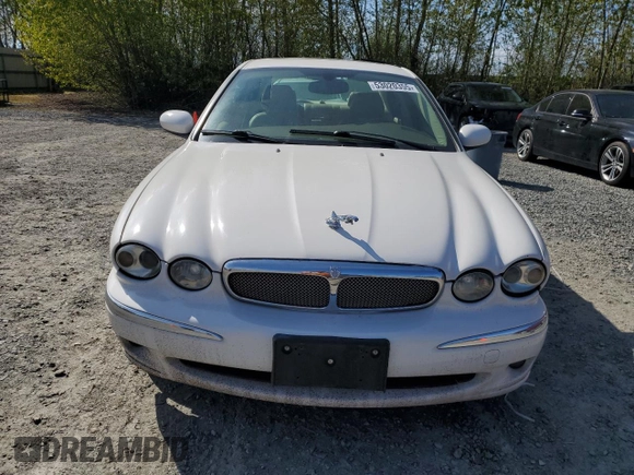 2006 Jaguar X-Type with VIN SAJWA51A06WE68591, listed as a Copart auction lot 53020355 with 179,379 mi miles and Salvage Title. Bid and sale history available at DreamBid. Image 5.